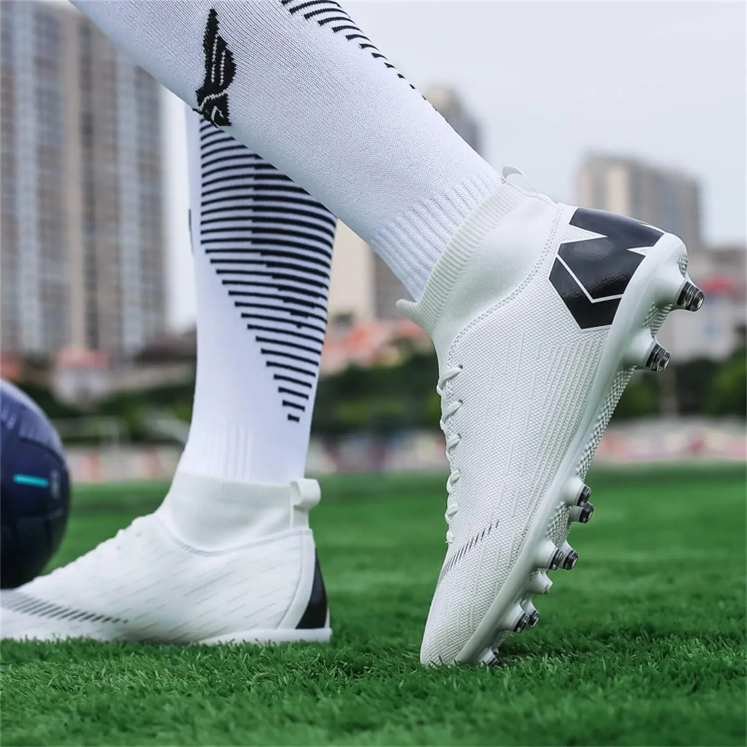 Unisex soccer sneakers are light, breathable, non-slip and shock-absorbing, and The youth high-top indoor lawn training hard bottom TF/AG.